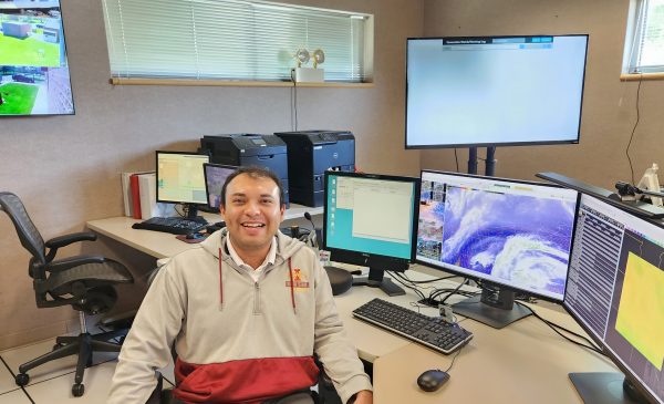 Jesse Castillo in the National Weather Service office.