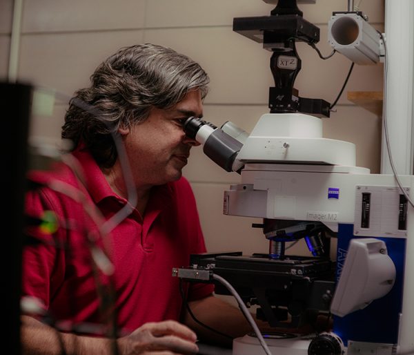 Mohan Gupta at the microscope