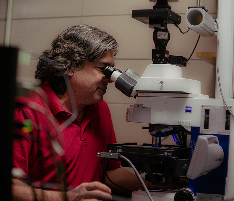 Mohan Gupta at the microscope